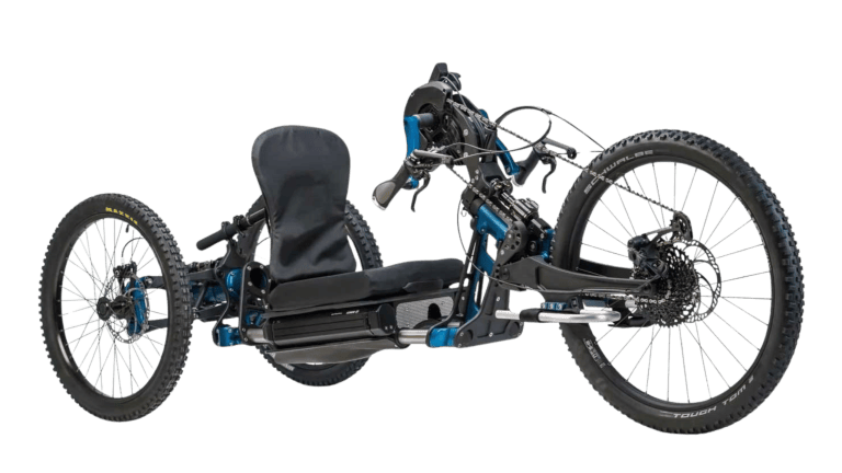 An off-road recumbent trike with large tires and a padded seat.