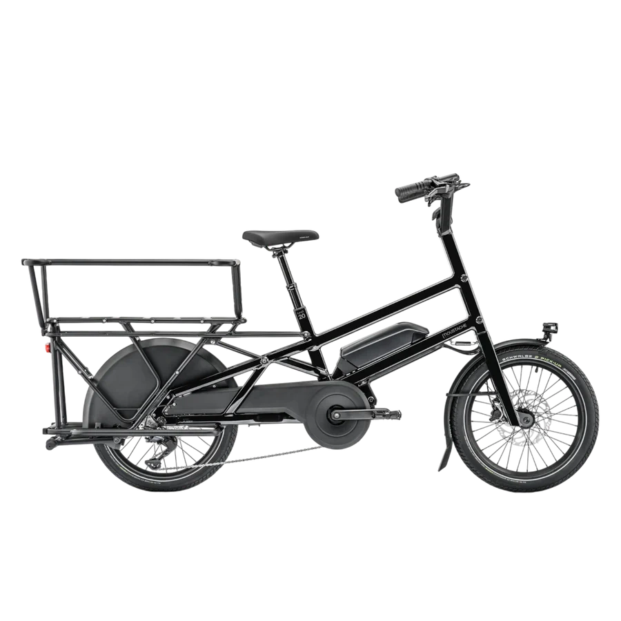 Black cargo bike with rear rack on white background.